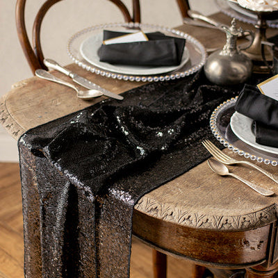 Black tulle table runner with Halloween spiders