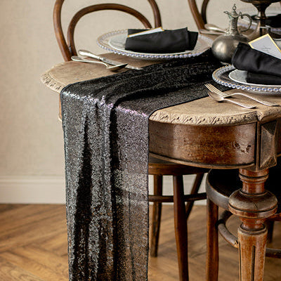 Black tulle table runner with Halloween spiders