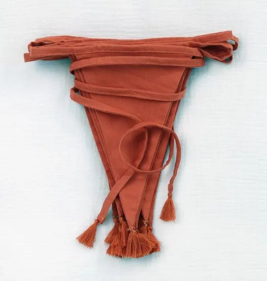 Terracotta fringed fabric garland