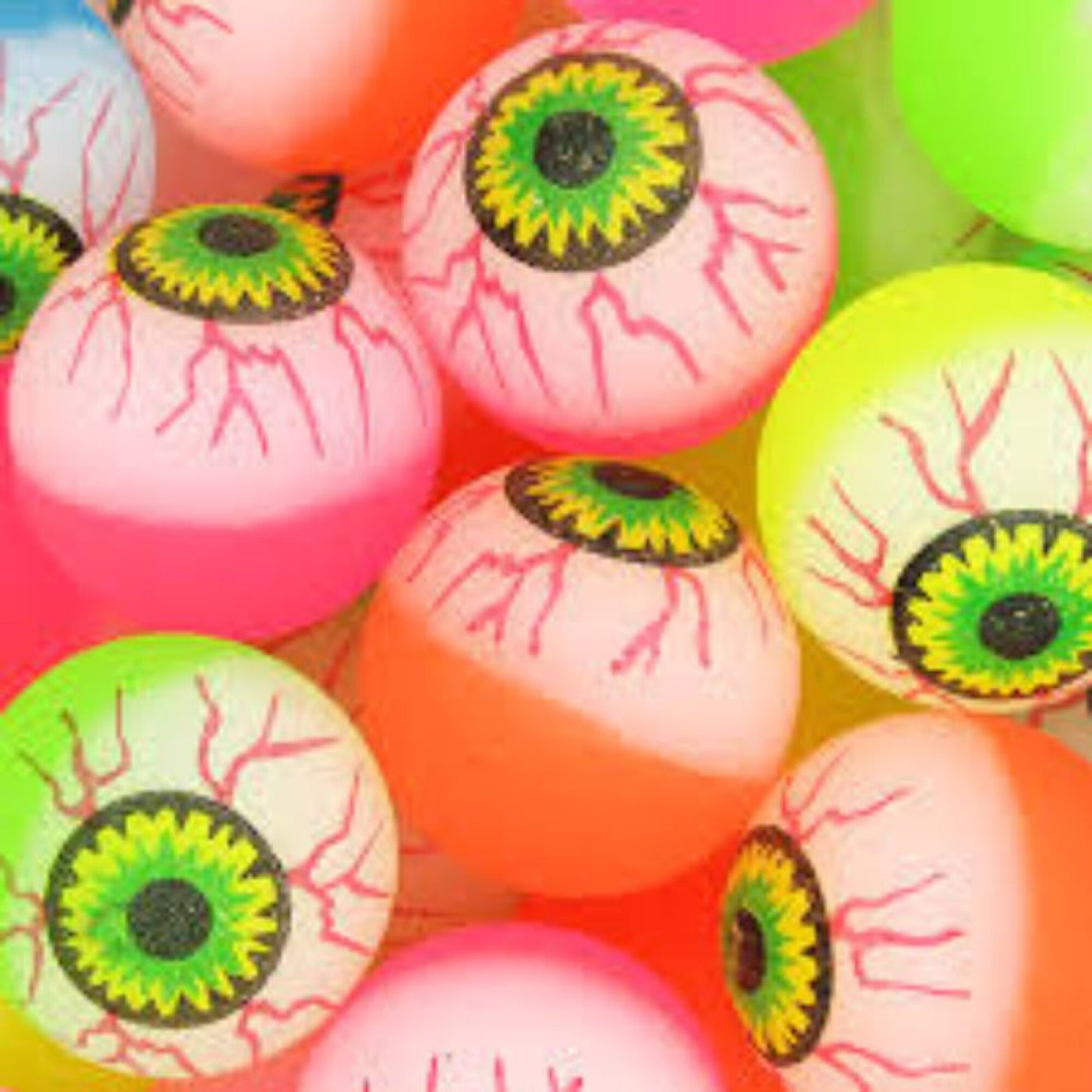 Pelotas saltarinas ojos halloween naranja y verde / 4 uds.
