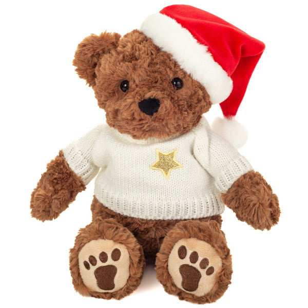 Classic Teddy con jersey y gorrito de Navidad suave 30 cm.