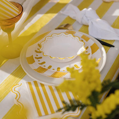 Yellow striped fabric tablecloth
