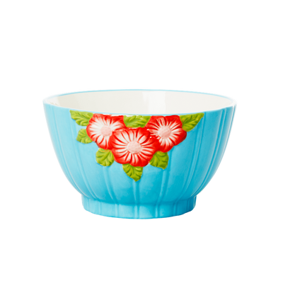 Turquoise ceramic bowl with red flowers