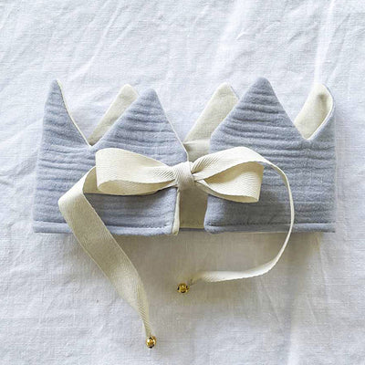 Light blue fabric crown with ribbon